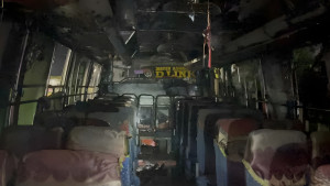 ধামরাইয়ে পার্কিং করা বাসে আগুন