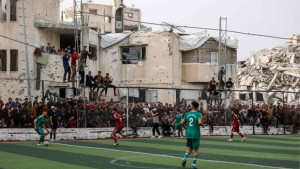 গাজার ধ্বংসপ্রাপ্ত পিচে ফুটবলের প্রত্যাবর্তন